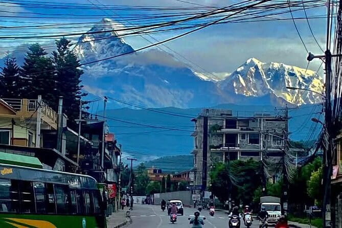Full day Suspension Bridge, Boating, George, Sightseeing Tour - Day 1: Davis Falls and the cave beneath Pokhara