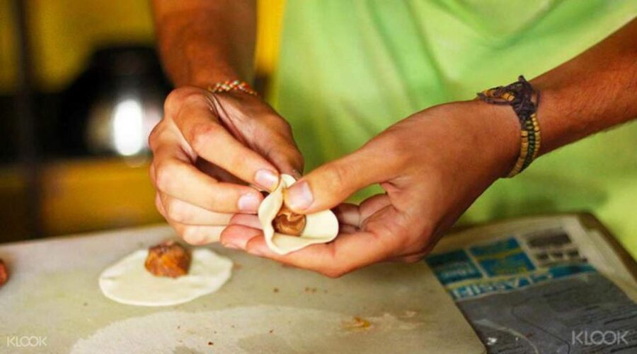 Kathmandu: Nepali Cooking Class with Hotel Pickup - In the kitchen: momos, curries, and Nepali breads