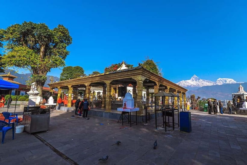 Pokhara: City Sightseeing Group Budget Bus Tour - Seti River Gorge offers a quick city-side contrast
