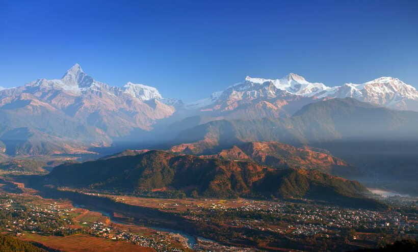 Pokhara Paragliding - Landing near Lakeside and collecting your flight media