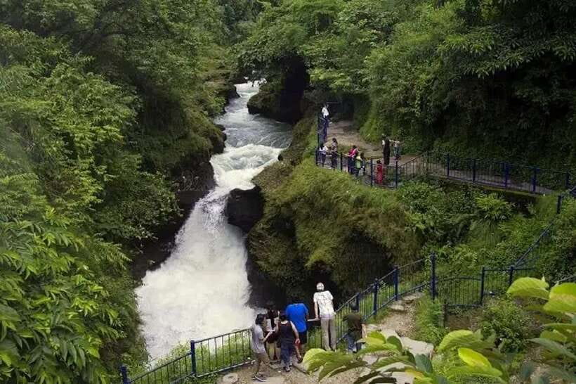 Pokhara: Sarangkot Sunrise And Private Full-Day Tour - Davis Falls and the changing waterfall
